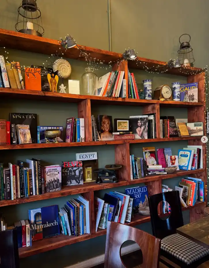 The Archive Café library shelves in Holmfirth